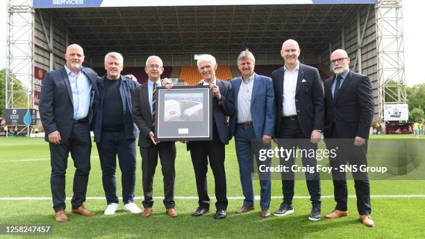 Ex Motherwell players presented with a picture to mark the official naming of the Tommy McLean stand during a cinch Premiership match between...