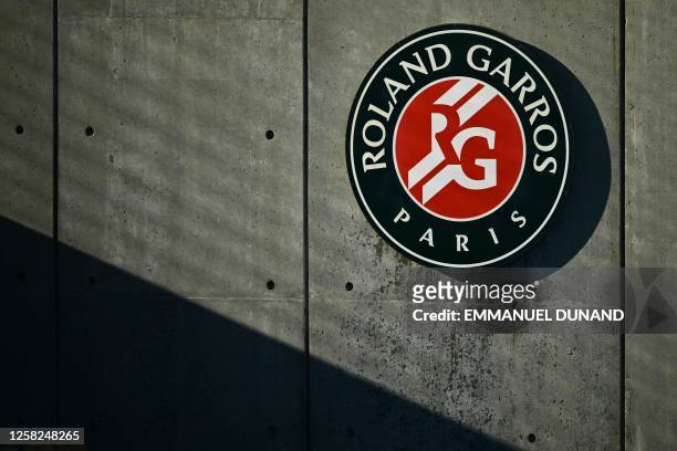 This photograph shows the logo of the Roland-Garros tournement during a men's singles match on day one of the Roland-Garros Open tennis tournament at...