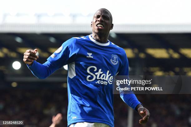 Everton's French midfielder Abdoulaye Doucoure celebrates at the end of the English Premier League football match between Everton and Bournemouth at...