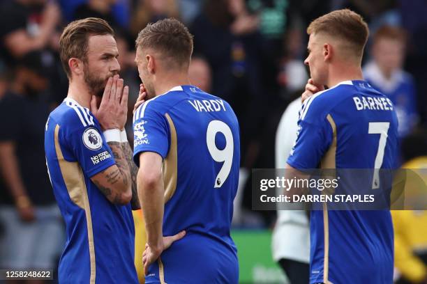 Leicester City's English midfielder James Maddison, Leicester City's English striker Jamie Vardy and Leicester City's English midfielder Harvey...