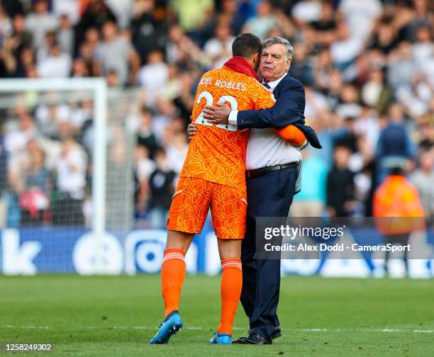 Leeds United head coach Sam Allardyce hugs Joel Robles after the Premier League match between Leeds United and Tottenham Hotspur at Elland Road on...