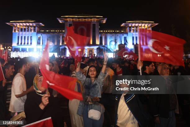 People gather outside the Presidential palace ahead of President Recep Tayyip Erdogan's victory speech after the Turkish presidential election runoff...