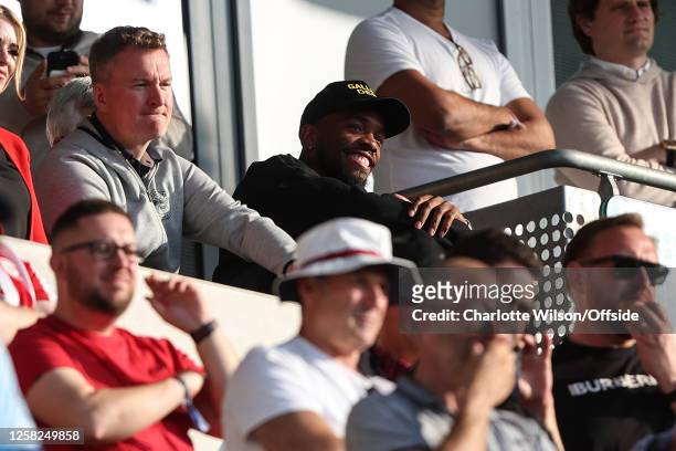 Ivan Toney of Brentford in the crowd due to his suspension for betting during the Premier League match between Brentford FC and Manchester City at...