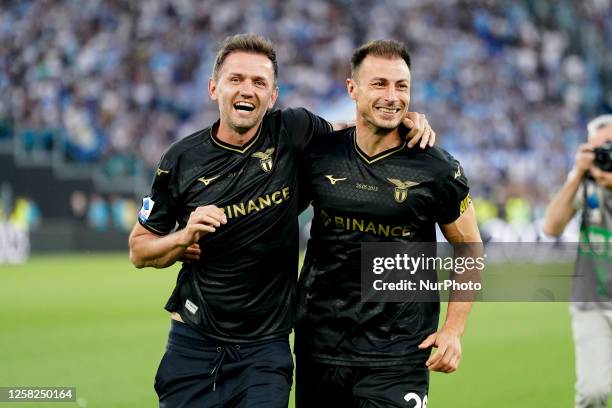 Stefan Radu of SS Lazio celebrates last match with SS Lazio with Senad Lulic former player of SS Lazio during the Serie A match between SS Lazio and...