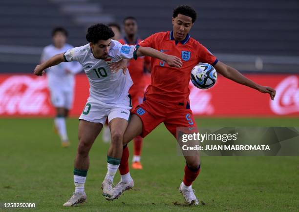 Iraq's midfielder Youssef Amyn and England's defender Bashir Humphreys vie for the ball during the Argentina 2023 U-20 World Cup Group E football...