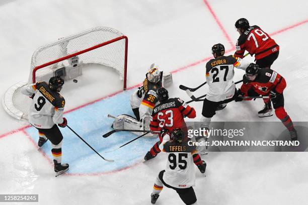 Canada's forward Sammy Blais scores the 3-2 goal during the IIHF Ice Hockey Men's World Championships final match betweeen Canada and Germany in...