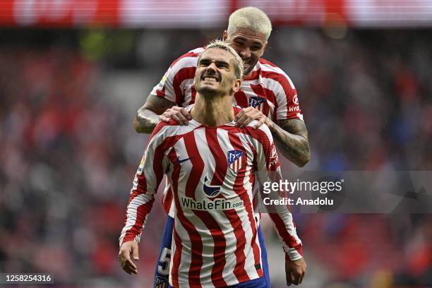 Antoine Griezmann and Rodrigo de Pau of Atletico Madrid celebrate after a goal during La Liga week 37 soccer match between Atletico Madrid and Real...