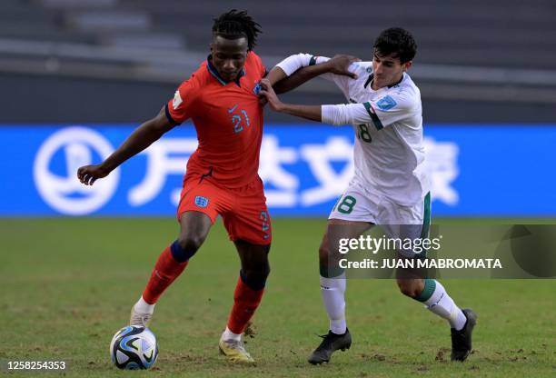 England's defender Daniel Oyegoke and Iraq's midfielder Ali Sadeq vie for the ball during the Argentina 2023 U-20 World Cup Group E football match...