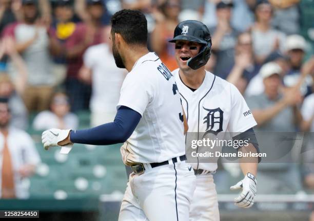 Spencer Torkelson of the Detroit Tigers celebrates after Riley Greene scored to tie the game against the Chicago White Sox at 5-5 during the ninth...