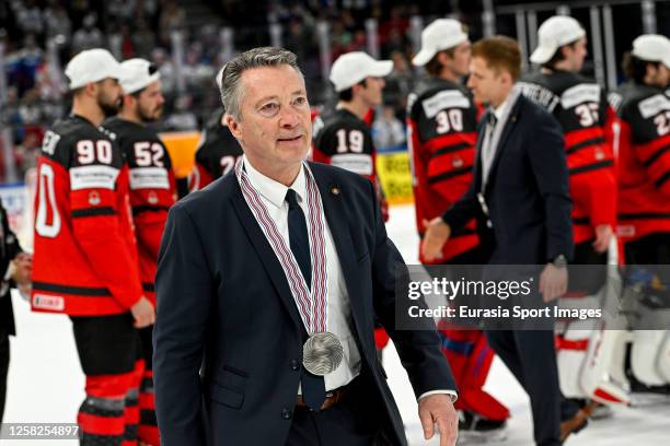 Head coach Harold Kreis of Germany with the silver medal during the 2023 IIHF Ice Hockey World Championship Finland - Latvia game between Canada and...