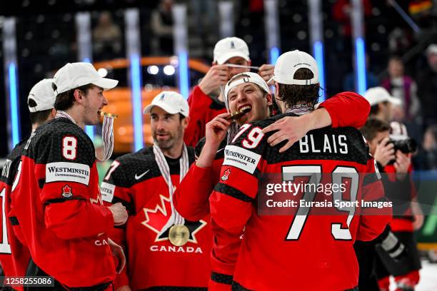 Jake Neighbours of Canada celebrate winning the gold medal with teammate Samuel Blais of Canada during the 2023 IIHF Ice Hockey World Championship...