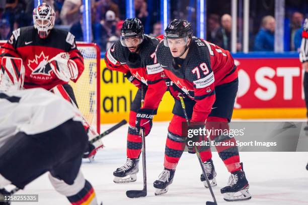 Pierre-Olivier Joseph of Canada and Samuel Blais of Canada ready for the face-off during the 2023 IIHF Ice Hockey World Championship Finland - Latvia...