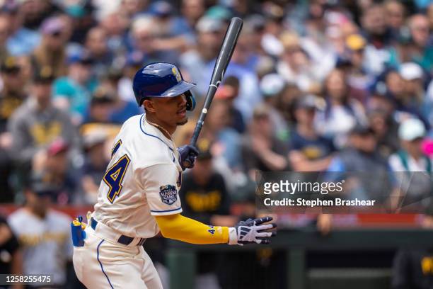 Julio Rodriguez of the Seattle Mariners hit a single off starting pitcher Luis L. Ortiz of the Pittsburgh Pirates during the third inning of a game...