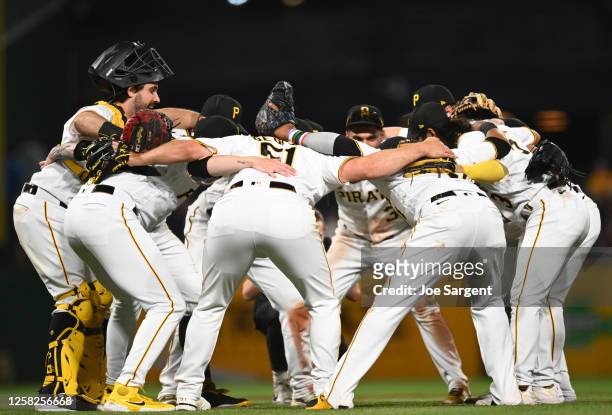 The Pittsburgh Pirates celebrate after defeating the Texas Rangers 6-4 during the game between the Texas Rangers and the Pittsburgh Pirates at PNC...