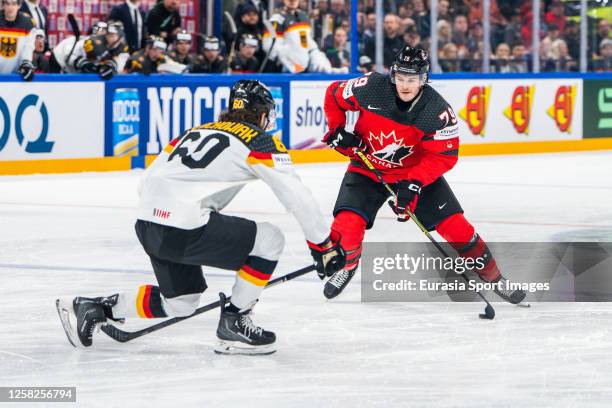 Samuel Blais of Canada in action against Wojciech Stachowiak of Germany during the 2023 IIHF Ice Hockey World Championship Finland - Latvia game...