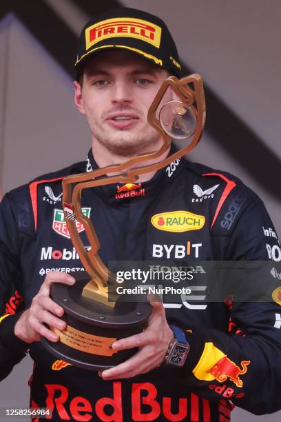 Max Verstappen of Red Bull Racing is seen with trophy on podium after winning the F1 Grand Prix of Monaco at Circuit de Monaco on May 28, 2023 in...