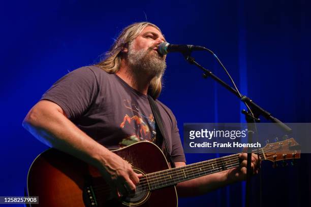 American singer Jake Smith, aka The White Buffalo, performs live on stage during a concert at the Columbia Theater on May 28, 2023 in Berlin, Germany.
