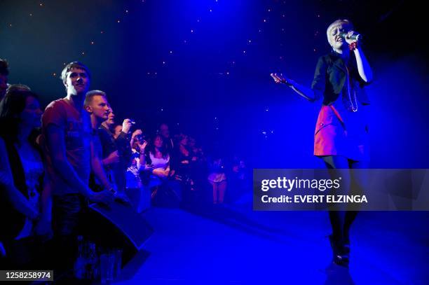Eurovision Songfestival-act from Serbia, Nina, sings on April 9, 2011 during a promotional performance in a club in Amsterdam. AFP PHOTO ANP KIPPA...
