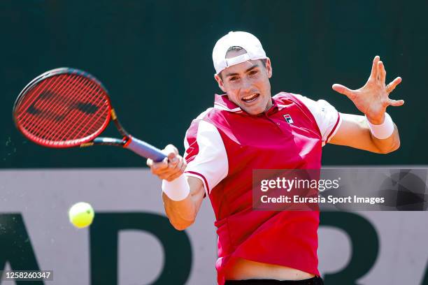 John Isner of USA plays a forehand against Nuno Borges of Portugal during the Day One of French Open Roland-Garros on May 28, 2023 in Paris, France.