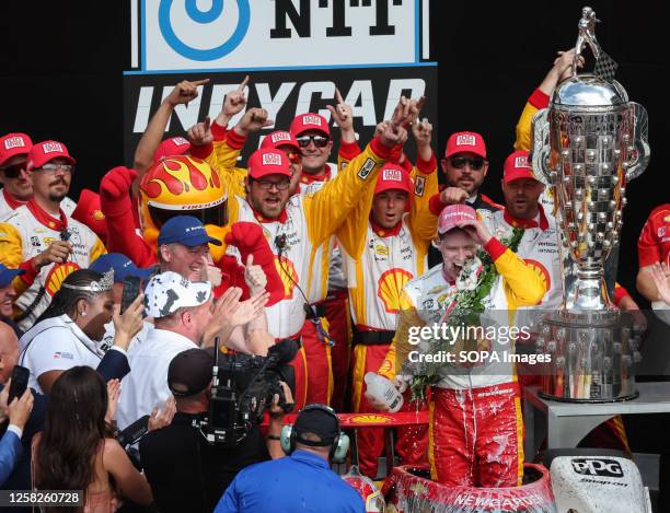 Team Penske driver Josef Newgarden of United States celebrates winning the 2023 Indy 500 at Indianapolis Motor Speedway in Indianapolis. It was his...