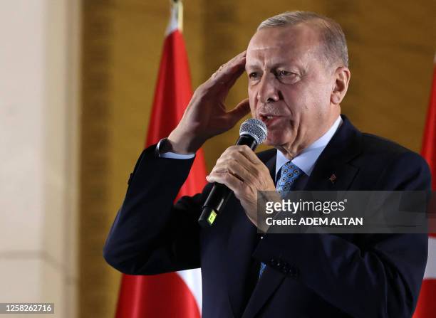 Turkish President Tayyip Erdogan addresses his supporters following his victory in the second round of the presidential election at the Presidential...