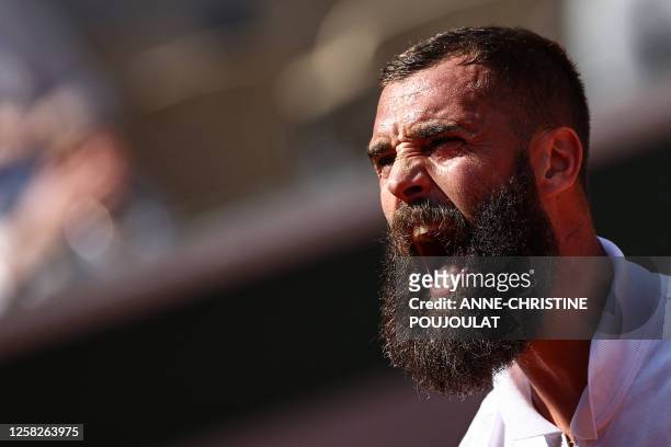 France's Benoit Paire reacts as he plays against Britain's Cameron Norrie during their men's singles match on day two of the Roland-Garros Open...