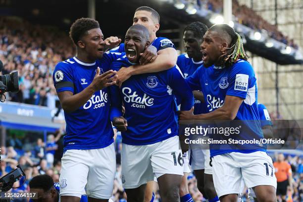 Abdoulaye Doucoure of Everton celebrates with teammates after scoring their 1st goal during the Premier League match between Everton FC and AFC...
