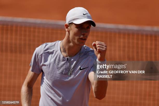 Canada's Denis Shapovalov celebrates a point against US Brandon Nakashima during their men's singles match on day two of the Roland-Garros Open...