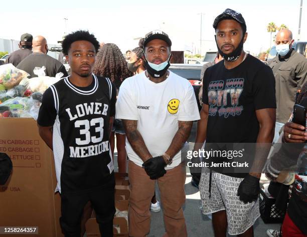 Roddy Ricch, Mustard and Trey Songz volunteer at the Feed Your City Challenge Event hosted by Mustard, Roddy Ricch and Jhene Aiko at Baldwin Hills...