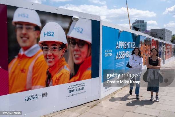 Promotional hoardings surround the construction site as work continues on the HS2 mainline station near to Euston on 24th May 2023 in London, United...