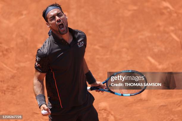 Italy's Fabio Fognini celebrates after winning against Canada's Felix Auger-Aliassime during their men's singles match on day two of the...