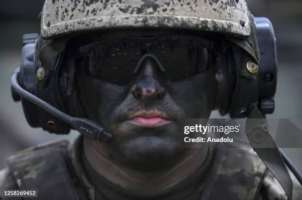 Military personnel member takes part in the âDefense Shield 23â multinational battle group military exercises in Novo Selo, Bulgaria on May 29, 2023....