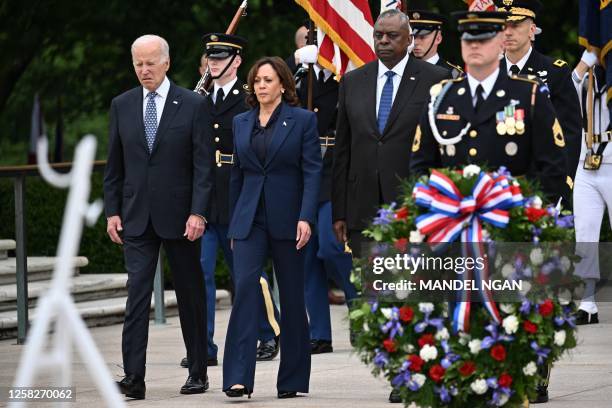 President Joe Biden, US Vice President Kamala Harris, and US Defense Secretary Lloyd Austin arrive to participate in a wreath-laying ceremony at the...