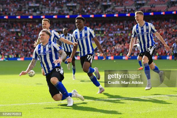 Josh Windass of Sheffield Wednesday celebrates scoring a goal during the Sky Bet League One Play-Off Final between Barnsley and Sheffield Wednesday...