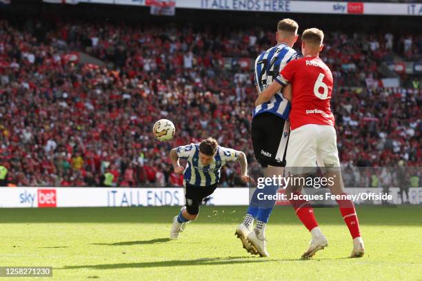 Josh Windass of Sheffield Wednesday scores their first goal during the Sky Bet League One Play-Off Final between Barnsley and Sheffield Wednesday at...