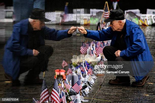 David Loesch, a 101st Airborne Veteran of the Vietnam War, searches for the names of soldiers from his unit amongst the names engraved on the Vietnam...