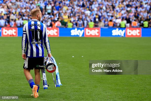 Barry Bannan of Sheffield Wednesday celebrates with the trophy after the Sky Bet League One Play-Off Final between Barnsley and Sheffield Wednesday...