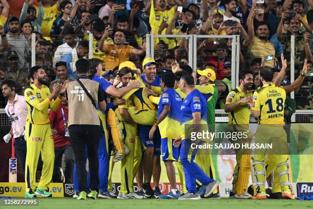 Chennai Super Kings' players celebrate their win at the end of the Indian Premier League Twenty20 final cricket match between Gujarat Titans and...