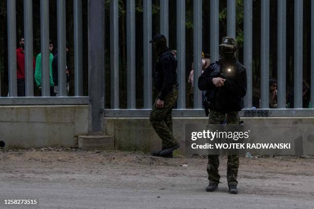 Border guards patrol along the border wall at Polish - Belarus border not far from Bialowieza, eastern Poland, on May 29, 2023.