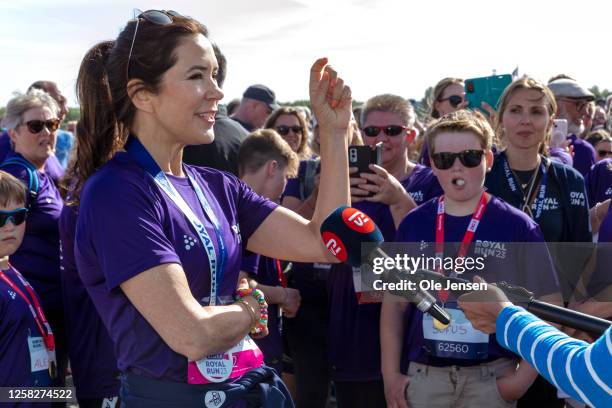 Crown Princess Mary of Denmark is interviewed after crossing the finish line at the Royal Run event on May 29, 2023 in Nykobing Falster, Denmark....