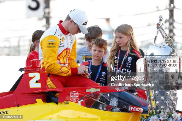 IndyCar series driver Josef Newgarden signs autographs on May 29 after winning the 107th running of the Indianapolis 500 at the Indianapolis Motor...