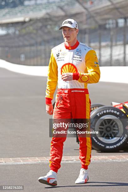 IndyCar series driver Josef Newgarden walks across the front straightaway on May 29 after winning the 107th running of the Indianapolis 500 at the...