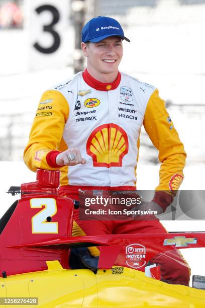 IndyCar series driver Josef Newgarden poses for a photo in his car on May 29 after winning the 107th running of the Indianapolis 500 at the...