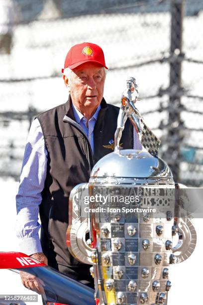 IndyCar series car owner Roger Penske who has won the Indianapolis 500 a record 19 times stands next to the Borg Warner Trophy on May 29 after being...