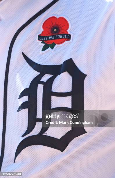 Detailed view of the special patch to honor Memorial Day worn on players and coaches jerseys during the game between the Detroit Tigers and the Texas...