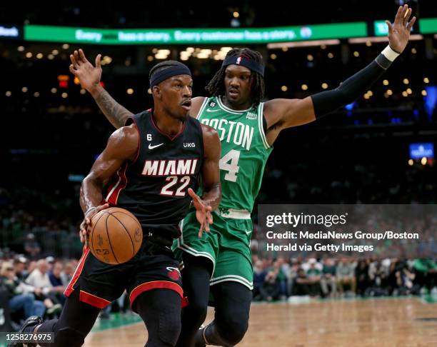 Robert Williams III of the Boston Celtics plays defense against Jimmy Butler of the Miami Heat during the first quarter of Game 7 of the NBA Eastern...