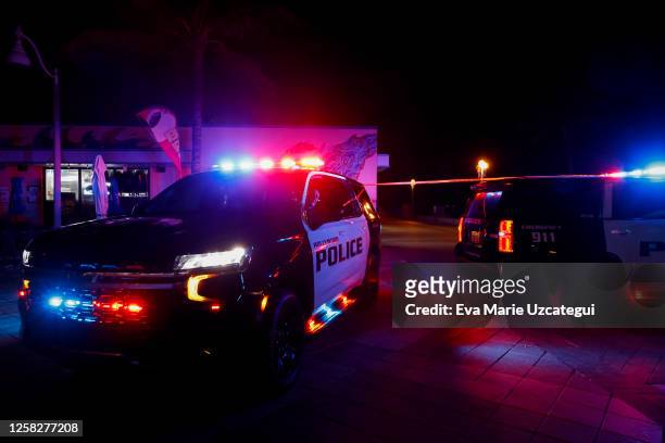 Law enforcement officers respond to a shooting at Hollywood Beach on May 29, 2023 in Hollywood, Florida. At least nine people were hospitalized...