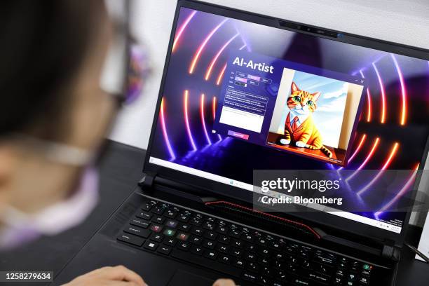 An artificial intelligence program producing artworks demonstrated at the Micro-Star International Co. Booth during the Taipei Computex expo in...