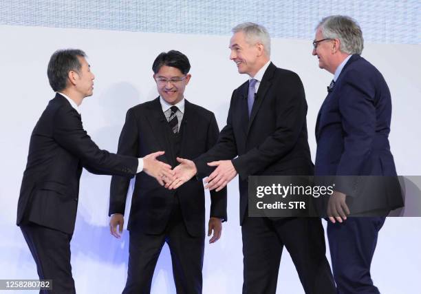 Hino Motors President Satoshi Ogiso, Toyota Motors President Tsuneharu Sato, Mitsubishi Fuso Truck and Bus President Karl Deppen and Daimler Trucks...