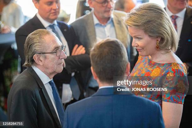 Former secretary general of NATO Willy Claes and Queen Mathilde of Belgium are seen during a reception following a ceremony for the Doctors Honoris...